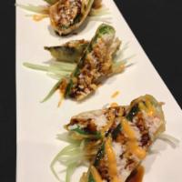 Stuffed Jalapenos · Tempura-fried jalapenos stuffed with cream cheese, mayo, snow crab mix. Topped with eel sauc...