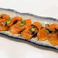 Salmon Carpaccio · Thin slice 5 pieces of fish, served with shishito pepper, ponzu and micro greens.