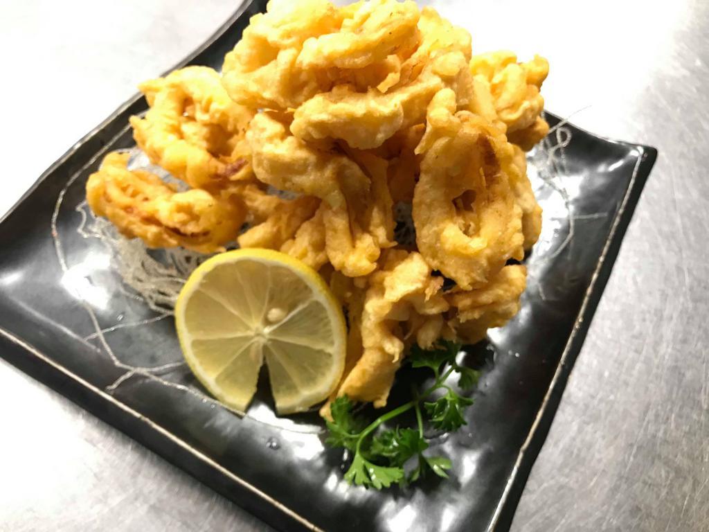 Crispy Calamari · Deep-fried crispy calamari served with spicy mayo sauce 
