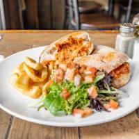 Chicken Parmigiano Panini · Freshly baked brickoven bread Served with fries and mesclun salad