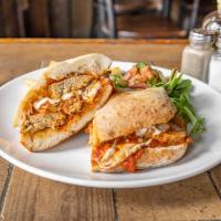Meatball Parmigiano Panini · Served with fries and mesclun salad