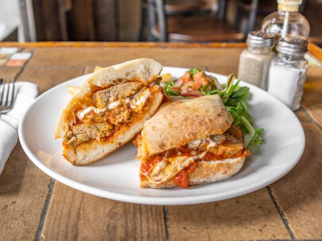 Meatball Parmigiano Panini · Served with fries and mesclun salad
