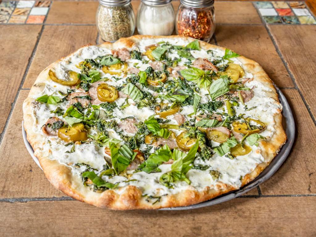 Al Diavolo Pizza · Broccoli rabe, sausage, hot cherry peppers and fresh mozzarella cheese.