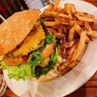 The Bite Me Burger  · Two 4 oz. all-beef patties topped with cheddar cheese, fetch special sauce, lettuce, tomato,...