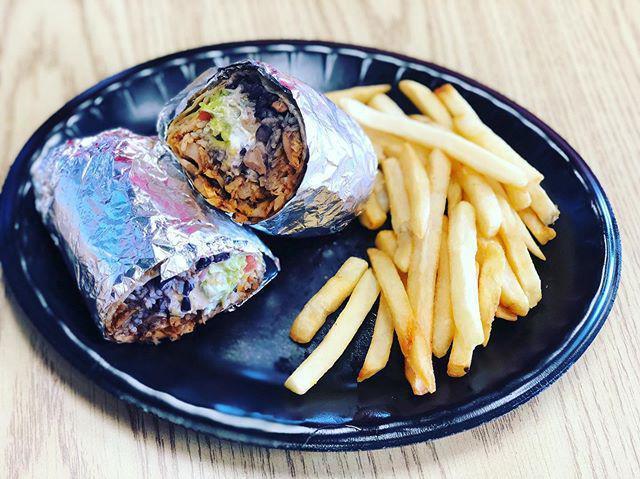 Chicken/steak (Special) Burrito · Served with guacamole, sour cream, pico de gallo, rice, beans, lettuce, corn kernels with 2 side orders and can of soda.