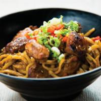 Garlic Noodles with Chicken · Thick Japanese noodles stir-fried with chicken, sliced garlic, butter, and soy sauce. Topped...