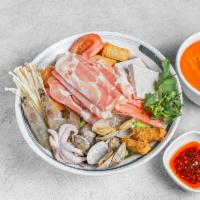 3. Thai Style Hot Pot · Pork slices, napa, ramen, taro, enoki mushroom, tomato, brown beech mushroom, shrimp, cuttle...