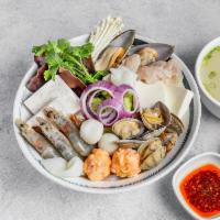 4. Seafood Hot Pot · Napa, ramen, soft tofu, taro, enoki mushroom, black fungus, shrimp, mussel, clam, fish fille...