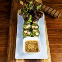 Fresh Rolls · Rice paper wrapped around organic spring mix, jicama, and organic tofu with a hint of herbal...