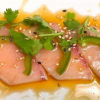 Yellowtail with Jalapeno · Thinly sliced yellowtail sashimi and jalapeño in ponzu sauce, topped with cilantro leaves. T...