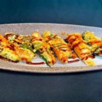 Jalapeno Bomb · Crab meat and cream cheese stuffed Jalapeno deep fried.  Topped with spicy mayo and eel sauc...