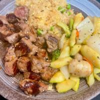 Hibachi Steak · Hibachi Style Steak with wok sauteed vegetables and fried rice.  Served with mushroom soup a...