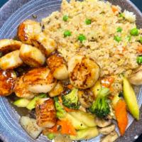 Hibachi Scallop · Hibachi Style Scallops with wok sauteed vegetables and fried rice.  Served with mushroom sou...