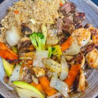 Hibachi Steak and Shrimp · Hibachi Style Steak and Shrimp with wok sauteed vegetables and fried rice.  Served with mush...