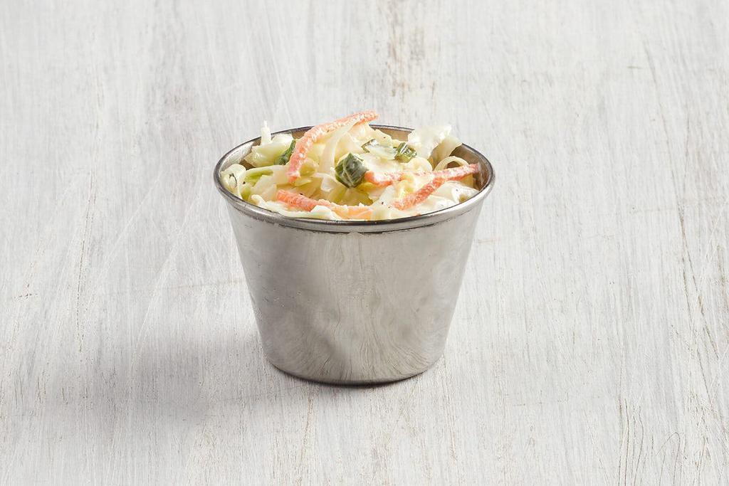 Coleslaw · With shredded cabbage, white vinegar, real mayo, spices, diced green onions and shredded carrots. (V)