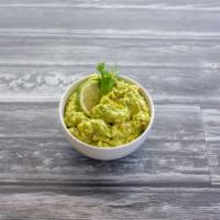 Guacamole · Mashed up avocados with cilantro and tomatoes.