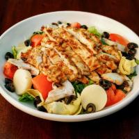 Milano Salad with Chicken · Green leaf lettuce, heart of palm, tomato, artichoke hearts, mushrooms and black olives and ...