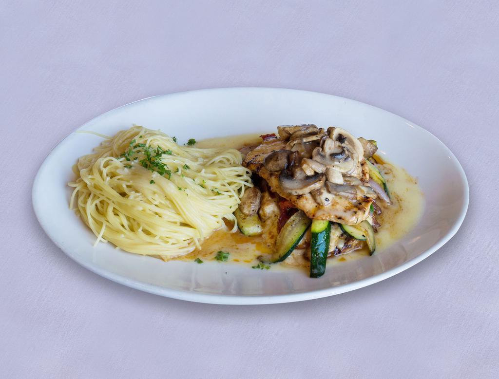 Chicken Napolitana Lunch · Grilled and stuffed with ricotta cheese, sun-dried tomatoes, mushrooms, red onions and zucchini in a lemon butter sauce. Served with a side of angel hair pasta topped with butter garlic sauce.