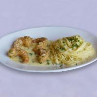 Shrimp Milano Lunch · Lightly breaded and grilled in garlic lemon butter sauce. Served with a side of angel hair p...