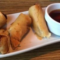 Deep Fried Vegetable Rolls · Deep fried egg rolls stuffed with silver noodle, vegetable, served with sweet and sour sauce.