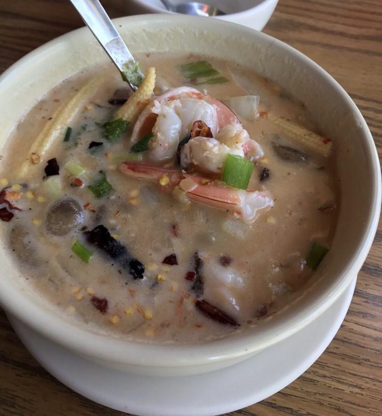 Tom Kha with Prawns Soup · Coconut milk soup with prawns, mushroom, onions and galangal topped with onion and cilantro.