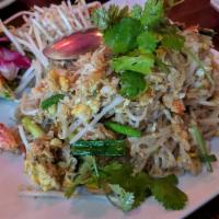 Pad Thai Crab · Stir-fried rice noodles with crab, egg, bean sprouts and onion topped with ground peanut.