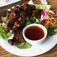 BBQ Honey Pork a la Carte · Seasoning grilled pork with honey and Thai seasoning served with sweet and sour sauce.