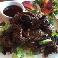 BBQ Honey Beef a la Carte · Seasoning grilled beef with honey and Thai seasoning served with sweet and sour sauce.