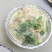 Fettuccine with Shrimp & Broccoli · Sauteed shrimp in fresh garlic, fresh Italian parsley & tossed in our homemade alfredo sauce...