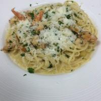 Linguine with Marinated Shrimp · Sauteed shrimp in fresh garlic, fresh Italian parsley & scallions. Served in a white wine sa...