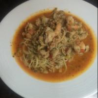 Linguine with Clams & Shrimp · Sauteed shrimp & baby clams in fresh garlic & scallions in white wine. Topped with fresh Ita...