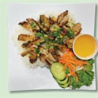 30. Com Ga Nuong · Grilled chicken with steamed rice.