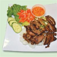 31. Com Thit Nuong · Grilled pork with steamed rice.