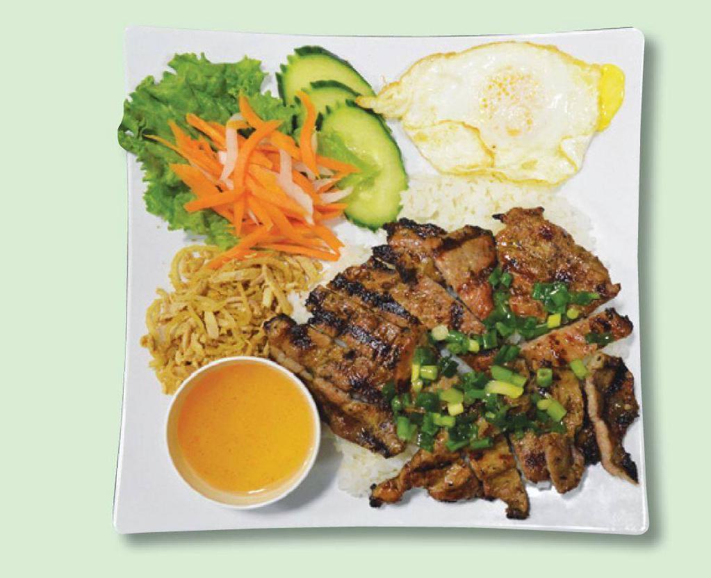 32a. Com Dac Biet Thit Nuong · Grilled pork, shredded pork and fried egg with steamed rice.