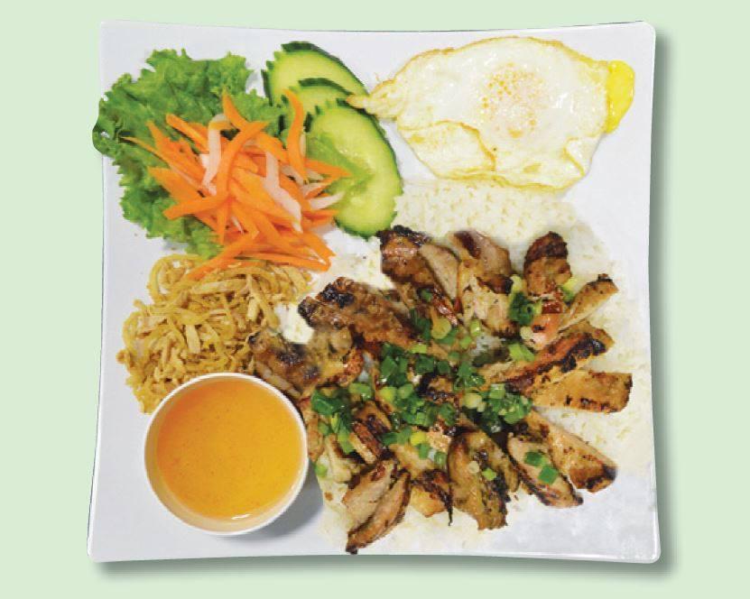 32b. Com Dac Biet Ga Nuong · Grilled chicken, shredded pork and fried egg with steamed rice.
