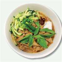 40. Hu Tieu Sate Bo · Rice noodle spicy sate peanut beef.