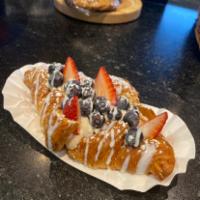 Fresh berries croissant  · Sweet cream, fresh berries, chocolate/ strawberry  sauce drizzle 