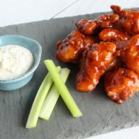 Boneless Wings · Hand-breaded & tossed in your choice of spicy Buffalo, cherry cola BBQ or sweet chili, serve...