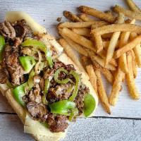 Philly Steak · Shaved steak, sautéed onions, green peppers & mushrooms with melted mozzarella on a hoagie r...