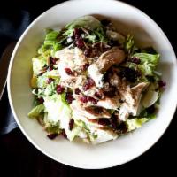 Chicken Cranberry Salad · Blue cheese, toasted almonds, dried cranberries, lettuce, and poppyseed dressing served on t...