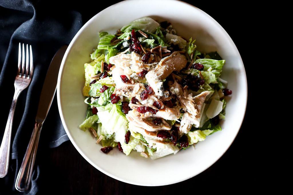 Chicken Cranberry Salad · Blue cheese, toasted almonds, dried cranberries, lettuce, and poppyseed dressing served on the side.