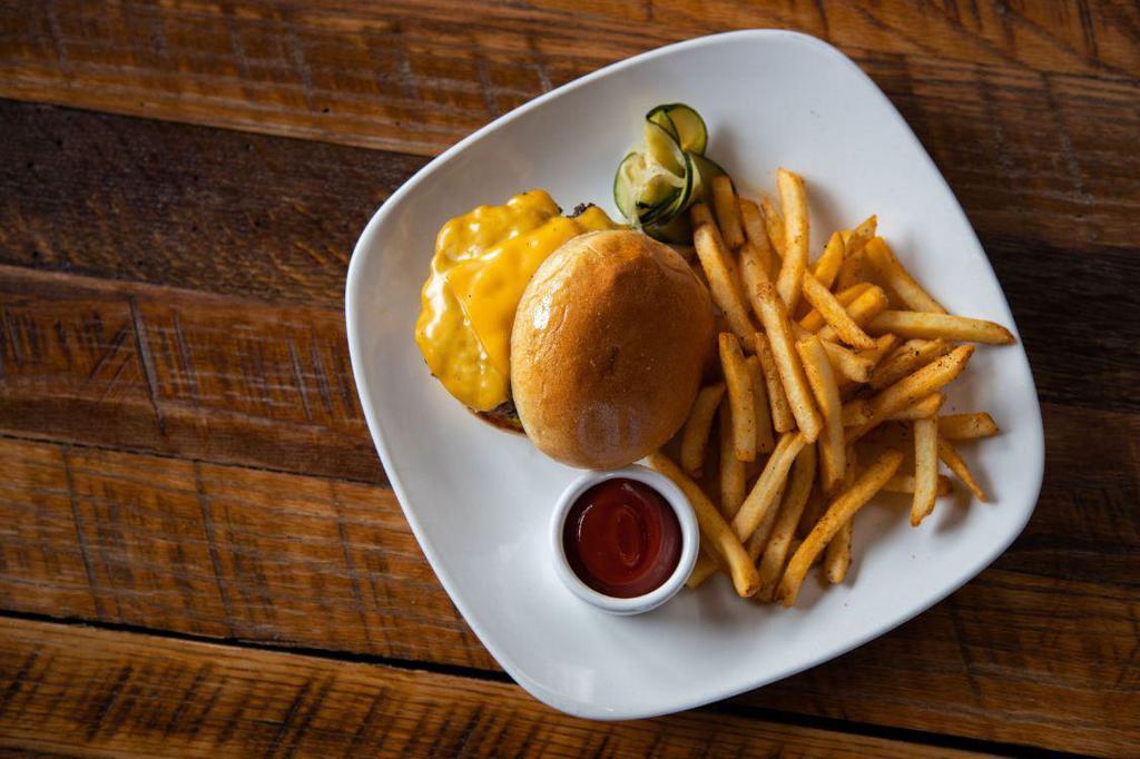 Cheeseburger · Smoked cheddar, American, Swiss or smoked gouda on a grilled potato bun.