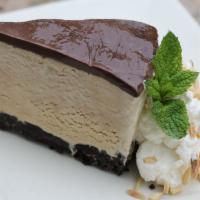 Mudslide Pie · Coffee ice cream, fudge, chocolate cookie crust, almonds.  The official dessert of our Citiz...