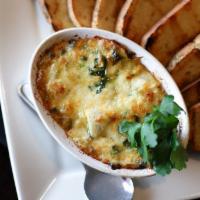 Parmesan Artichoke Dip Platter · By the pint, served with crostini.
