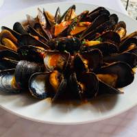 Cozze Rosso · Sauteed mussels in a marinara wine sauce.