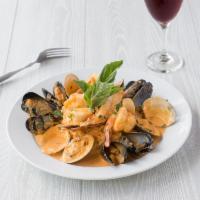 Risotto Villa Vito · Risotto with 1/2 lobster tail, shrimp, mussels, scallops and clams in a lobster cream sauce.