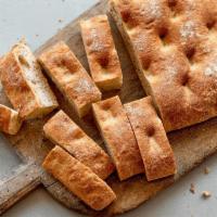 Herbed Focaccia Bread (v) · Made by tribeca oven with a small-batch, handcrafted approach. their dough = all-natural ing...