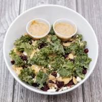The Kale and Quinoa Salad · Chopped kale and quinoa salad topped with Maui sweet onion, slivered almonds, pomegranate 