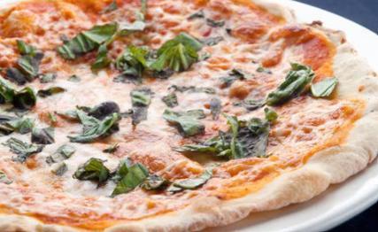 Margherita Pizza · Thin-crust pizza with marinara, mozzarella cheese, and fresh basil.