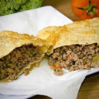 Pastel de Carne · Puff dough. Fried pastry (pastel) filled with beef.